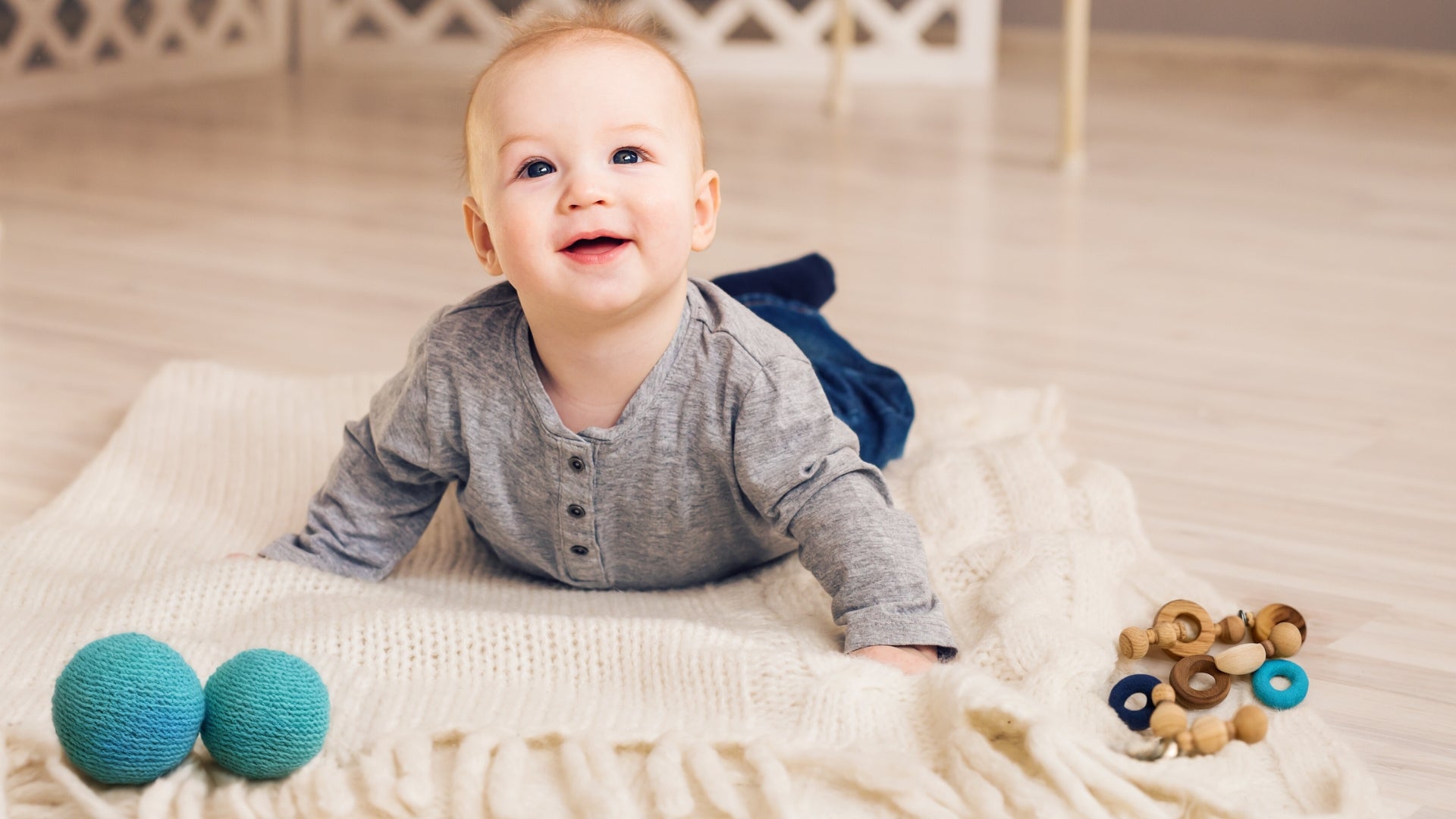 Baby lying on floor for tummy time