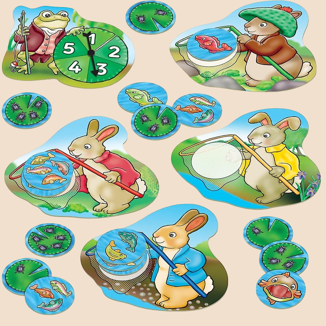Set of children's game pieces featuring animated characters from 'Peter Rabbit' with fishing rods and lures.