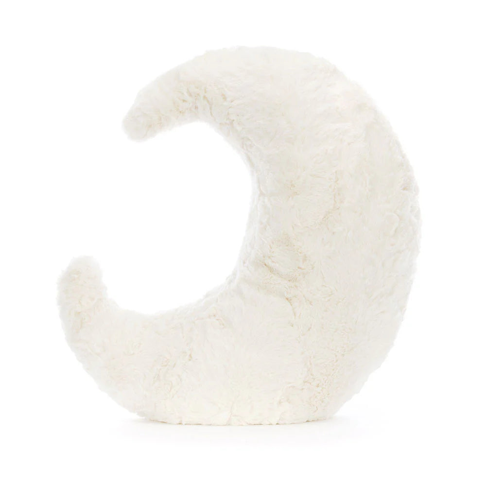 White crescent moon-shaped pillow on a white background