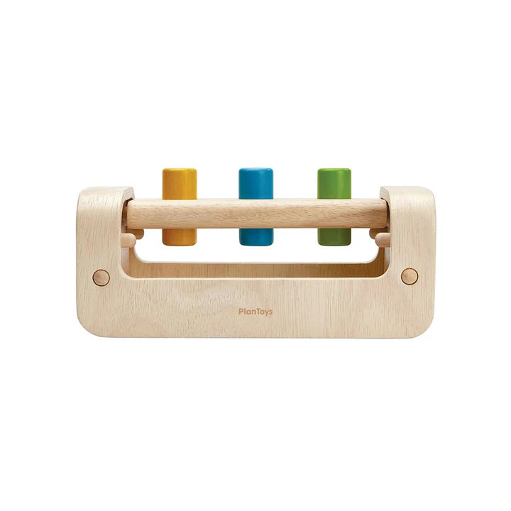 Wooden hammering toy with colorful cylindrical beads on a white background
