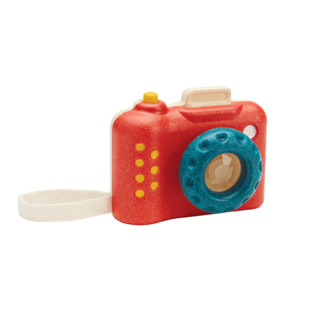 Wooden red and blue camera toy with kaleidoscope lens by Plan Toys - at Send A Toy