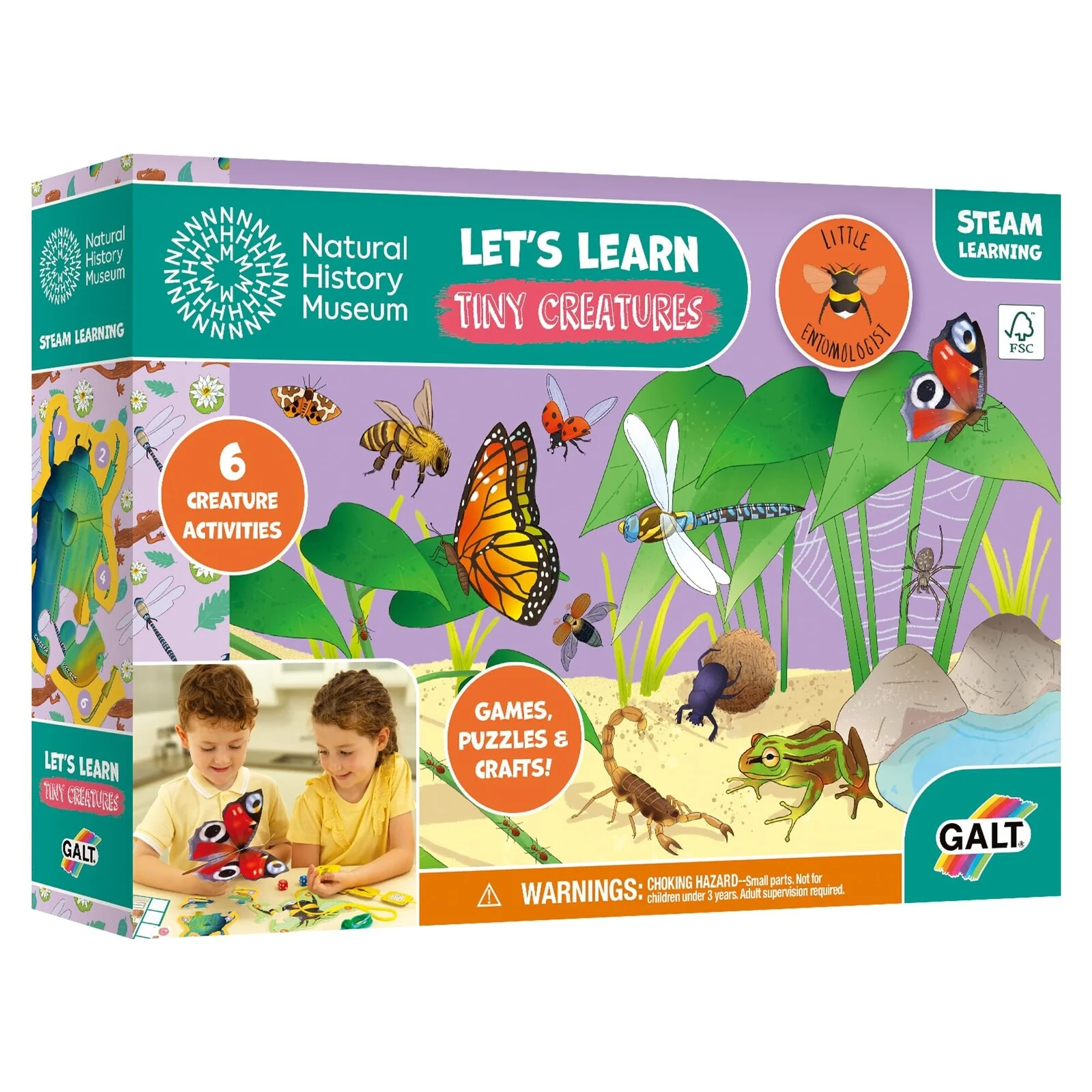 Boxed educational toy set 'Let's Learn Tiny Creatures' featuring images of children engaging with the activity kit, which includes illustrations of insects and spiders. The toy box is colorful with green, purple, and orange tones, and it displays the Galt brand logo.