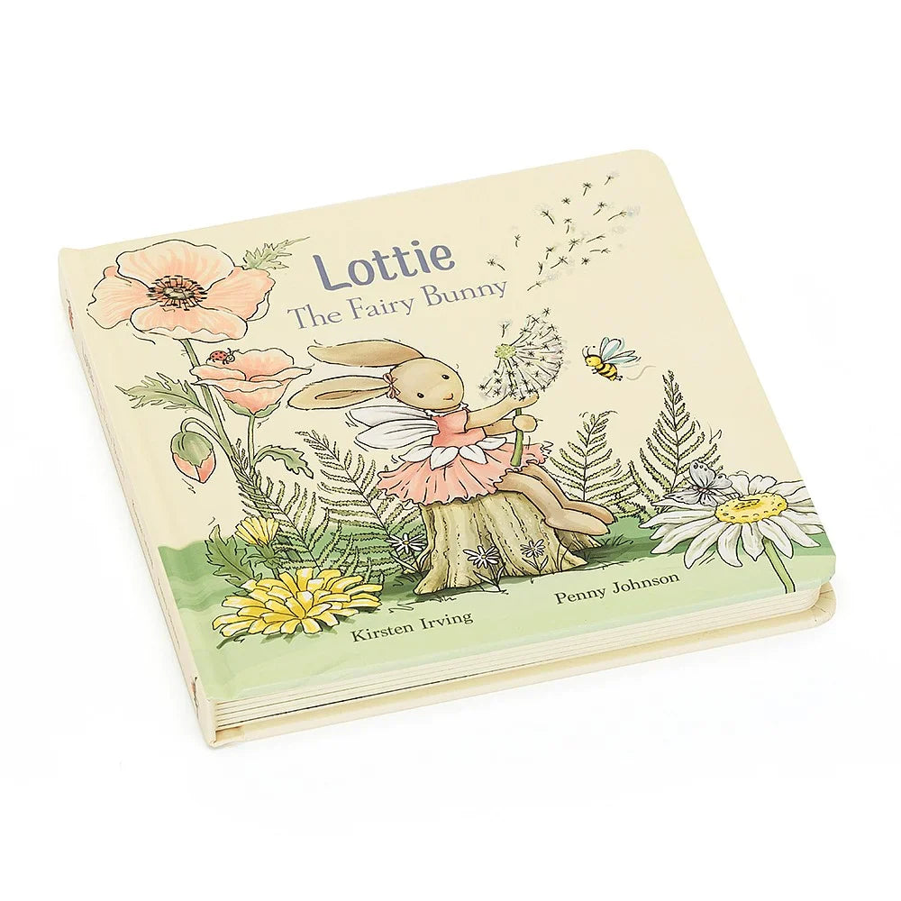 A Childs thick cardboard book with a pastel picture of a fairy bunny on the cover. The cover is printed with the words: Lottie The Fairy Bunny.