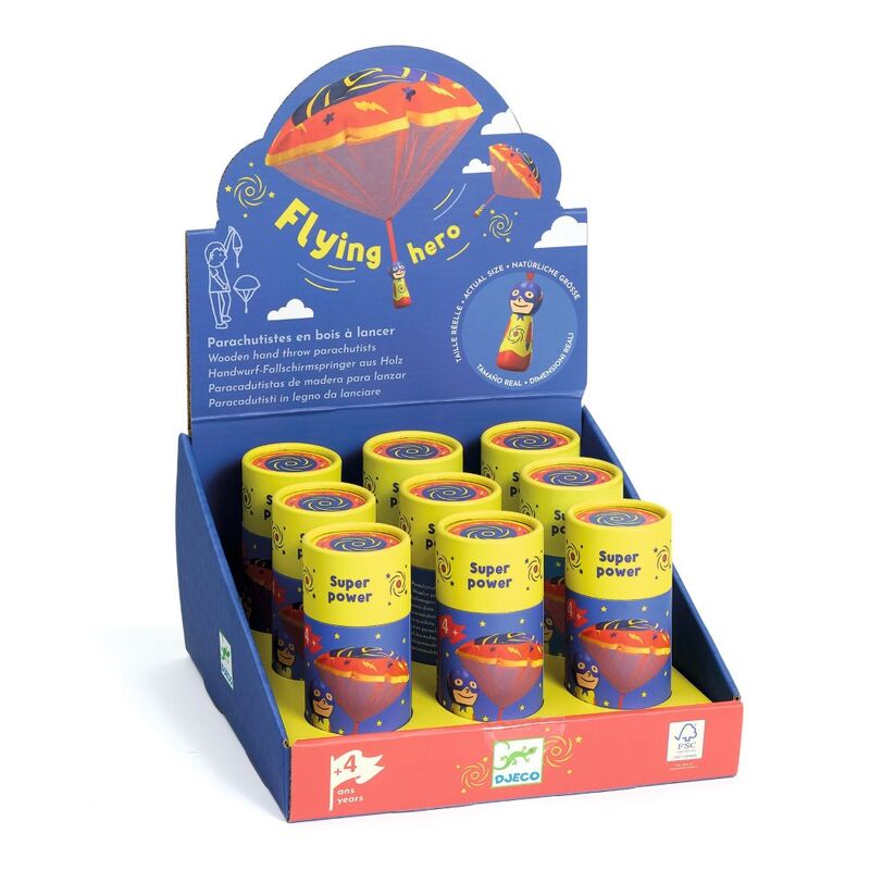 Display of 'Flying Hero' product with colorful packaging and toy parachutes.