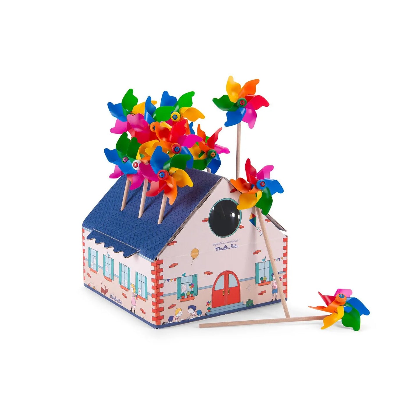 A colorful windmill toy with a blue house, red door, and multicolored flowers on top, set on a wooden stick.