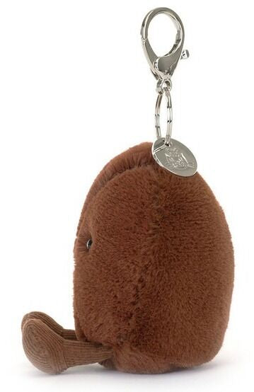 Brown coffee bean plush keychain with a metal clip on a white background