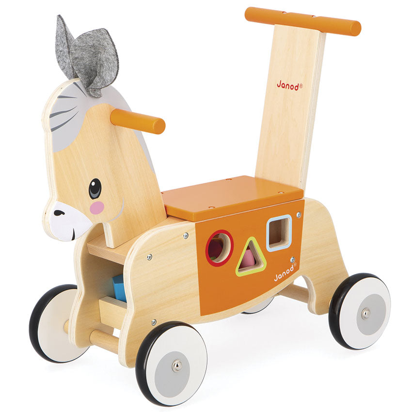 Wooden toy donkey with shape sorter and Janod branding on a white background