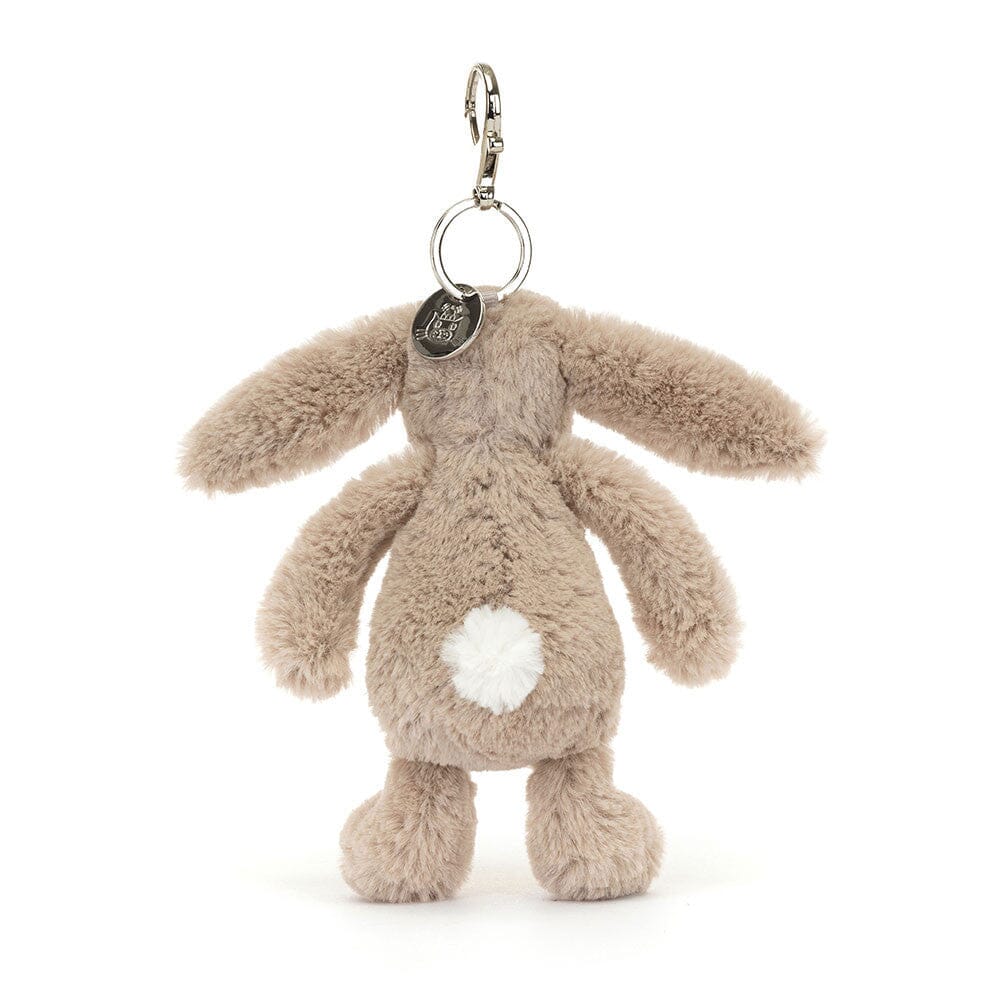 Plush bunny keychain with a white bob tail on a white background