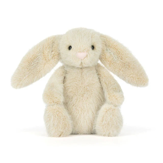 Plush bunny toy on a white background