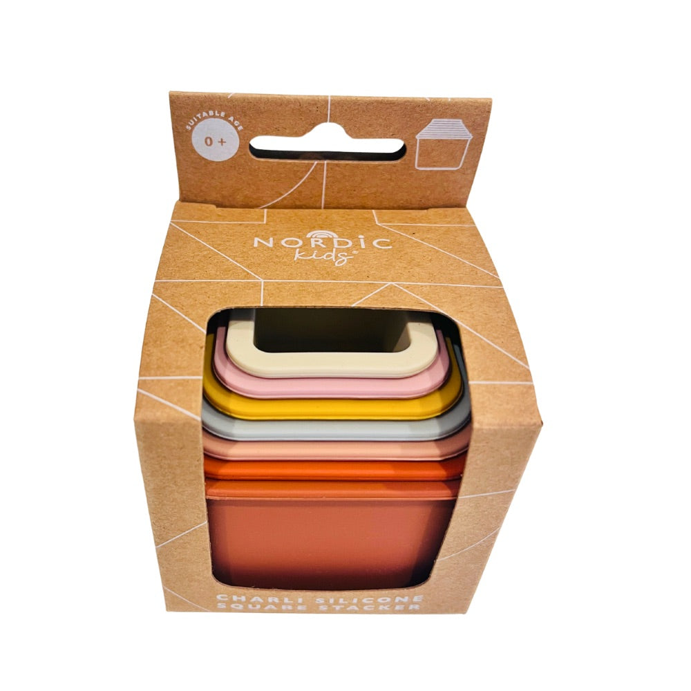 Baby toddler silicone square stacker nesting toy in natural kraft retail box. Designed by Nordic kids - Send A Toy online toy shop