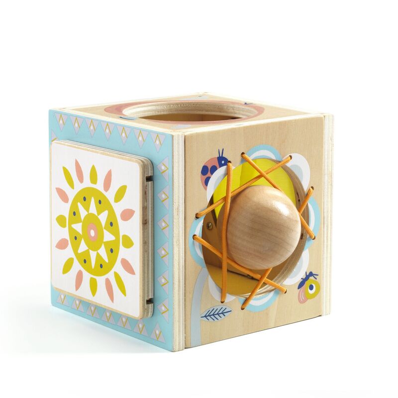 A colorful wooden baby activity toy designed as a cube with various openings and a ball inside.