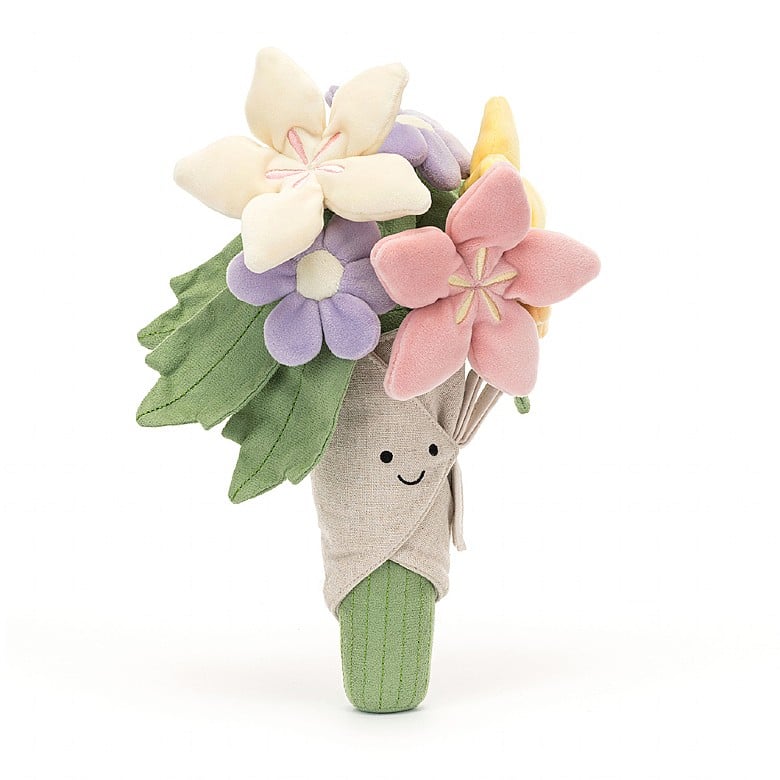 Plush toy resembling a bouquet of flowers with a smiling face on a white background