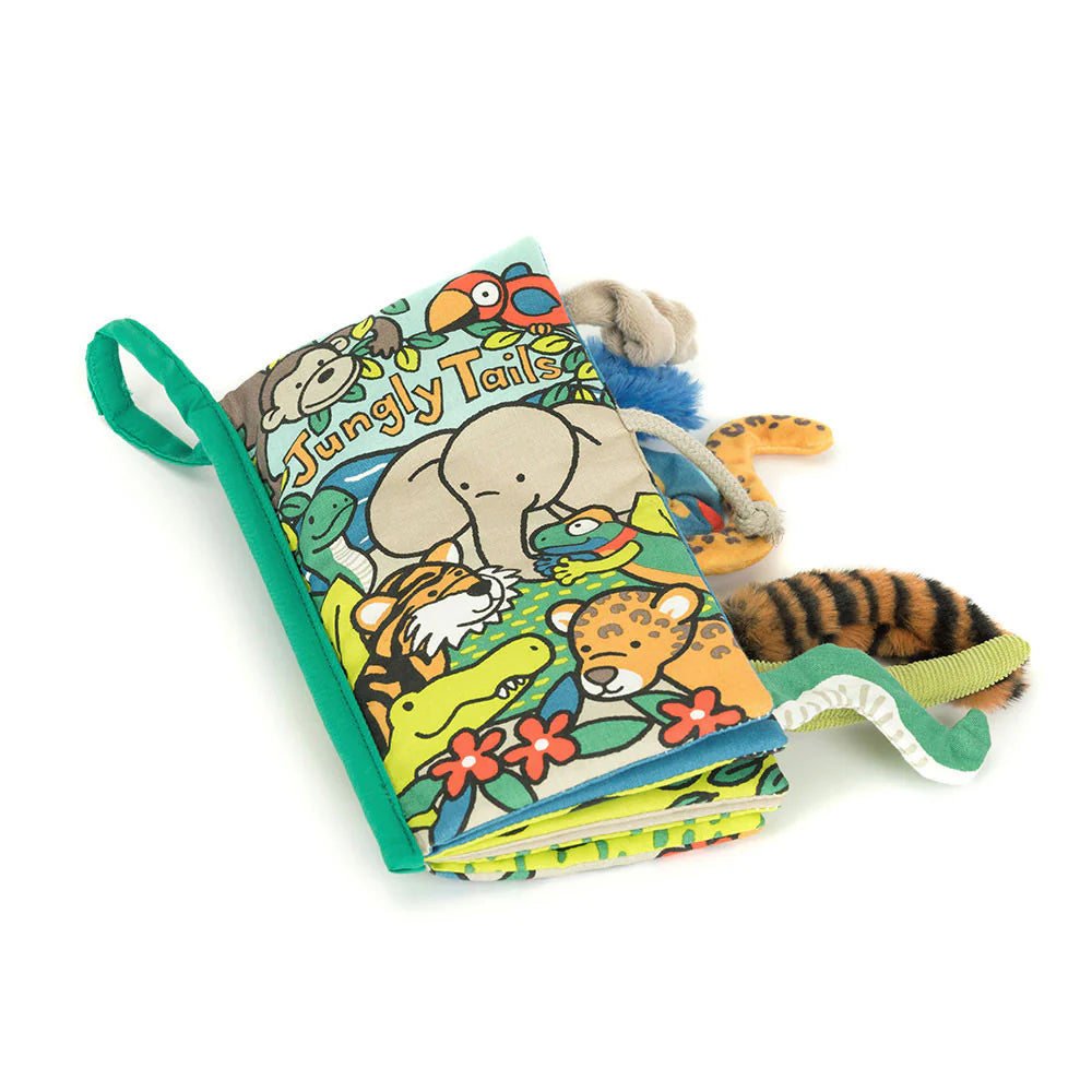 padded fabric book with jungle animal illustrations and 3D animal tails poking out.
