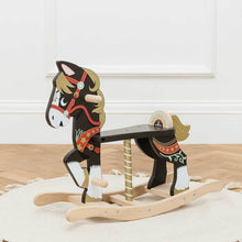 A chocolate brown circus style wooden rocking horse with friendly face, red halter and painted gold accents.