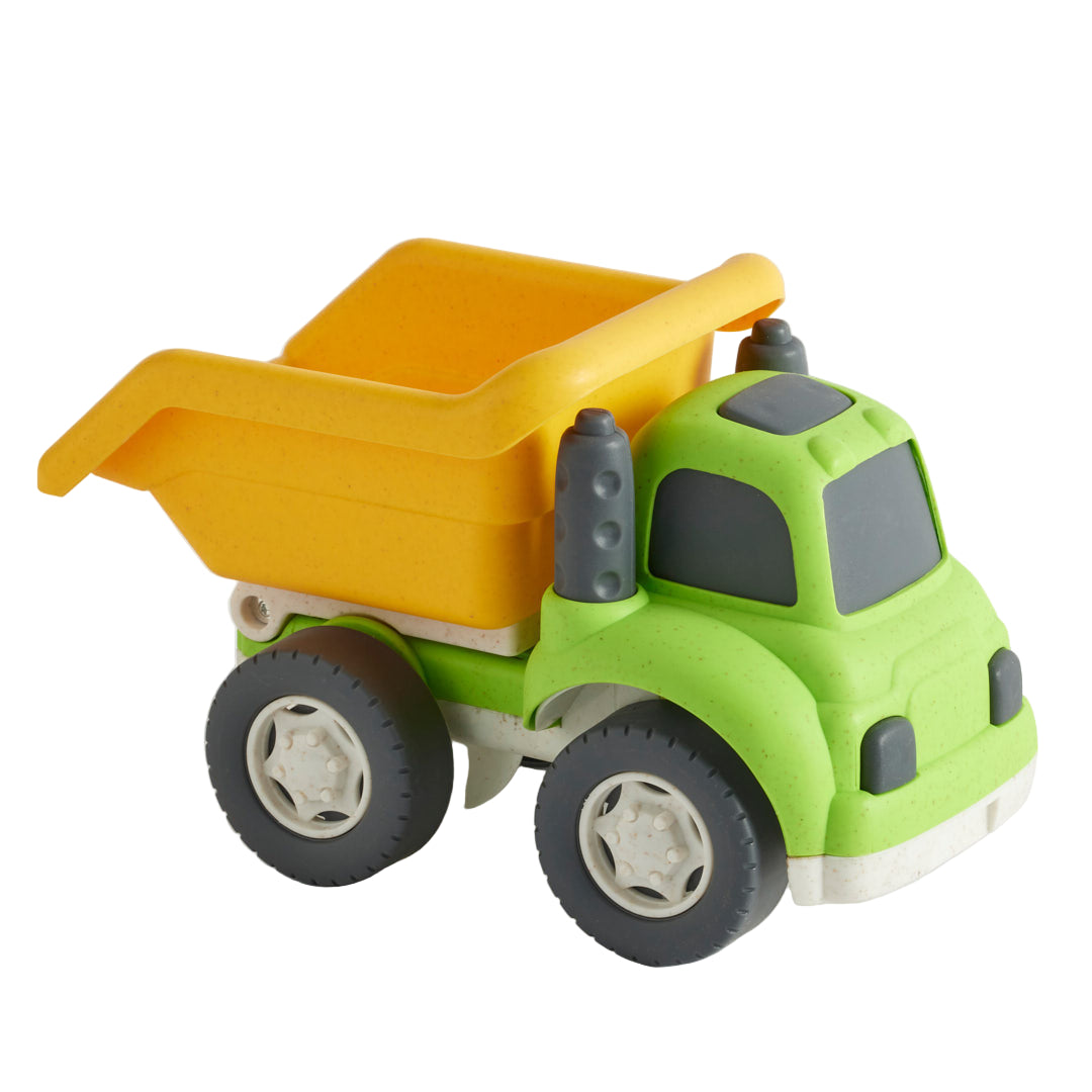 Toy dump truck with green body and yellow bed on a white background