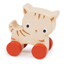 A wooden toy resembling a kitten with four orange wheels attached to its underside, designed for young children.