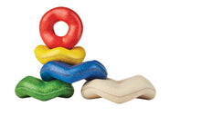 A set of colorful wooden stacking rings in red, blue, green, yellow, and beige, stacked in a pyramid shape.