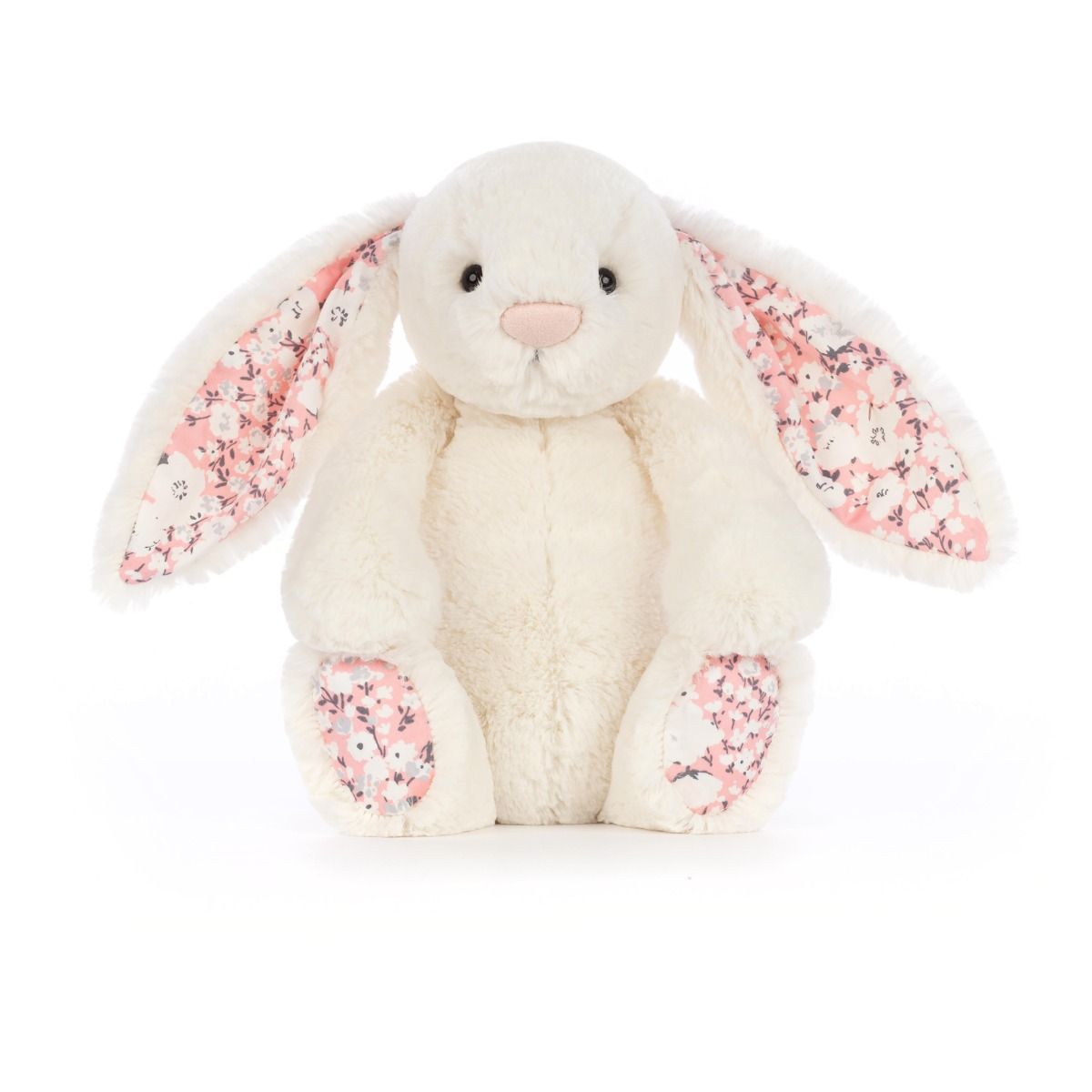 Cream Jellycat bunny stuffed toy with cherry blossom fabric accents on ears and feet