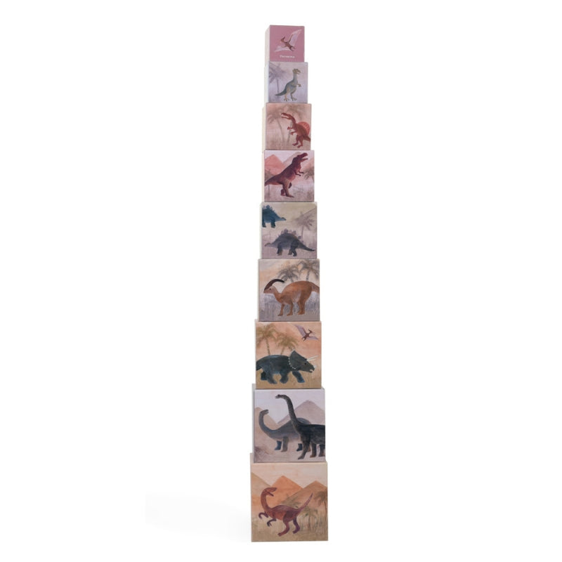 Stack of dinosaur-themed children's blocks on a white background
