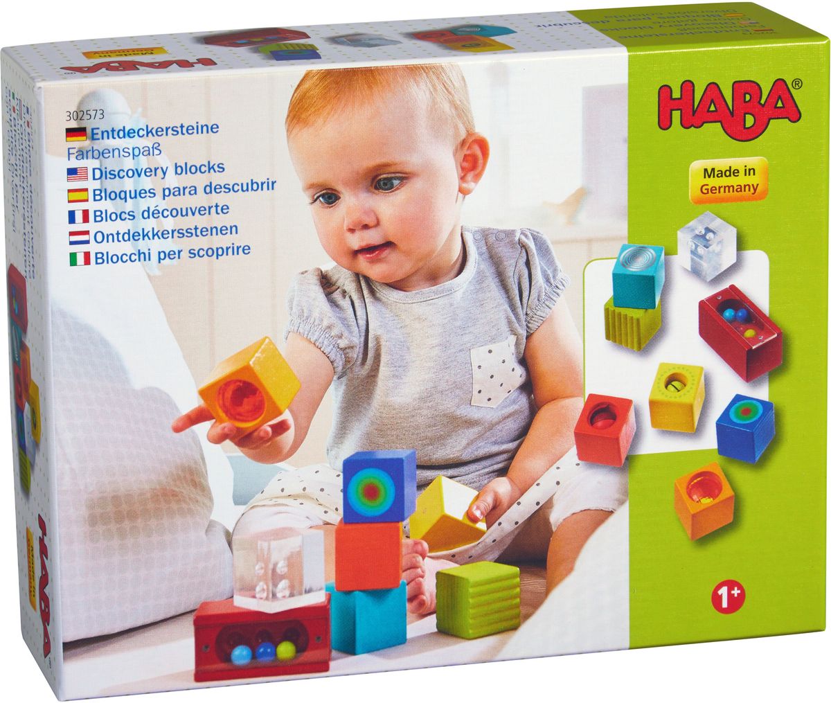 A set of colorful wooden blocks, each with a different sound effect or visual feature designed for toddler learning and play. Blocks presented an illustrated cardboard box.