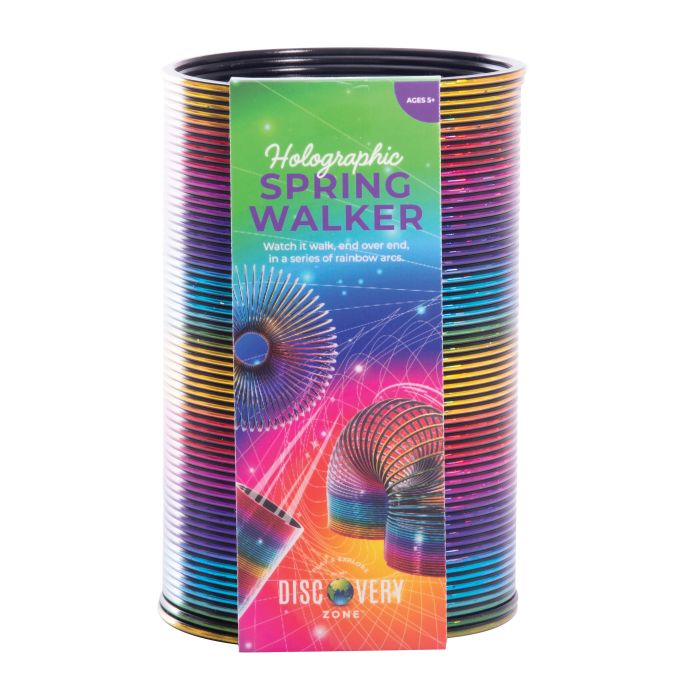 A multicolored spring walker toy with a grainbow hollographic finish, packaged in a cylindrical box with the product name and age recommendation visible.