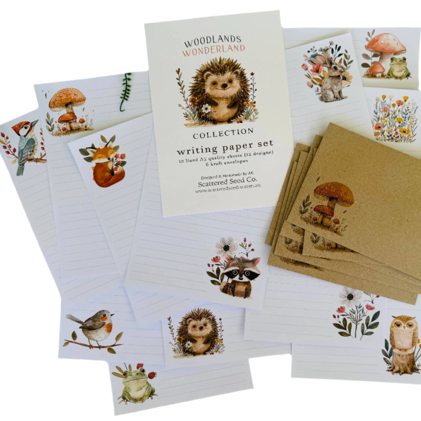 Kids cute letter writing set illustrated with hedgehog, raccoon, assorted woodland creatures. Natural kraft envelopes illustrated with woodland mushooms.
