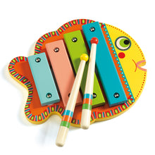 A colorful wooden xylophone designed in the shape of a fish, with four bars and two wooden mallets.