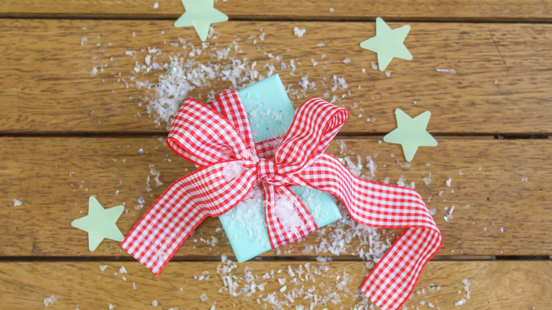 Gift wrapped present with gingham ribbon bow