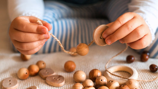 What is a Threading Toy and how can it help my preschooler?
