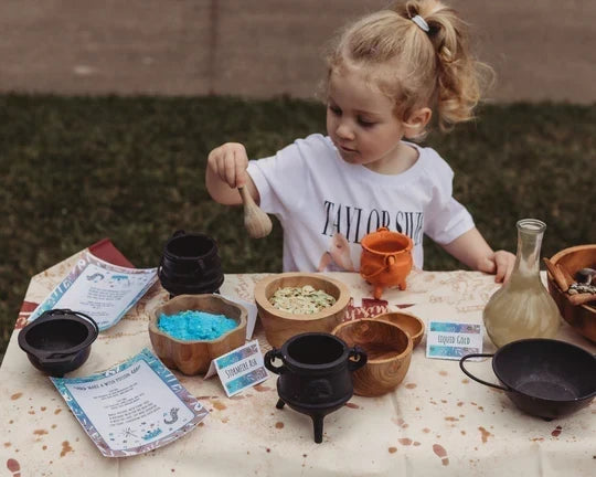 Child playing with The Little Potion Co. magic potion kit