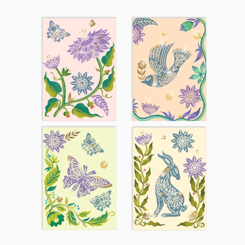 Four decorative cards with floral and animal designs on a white background