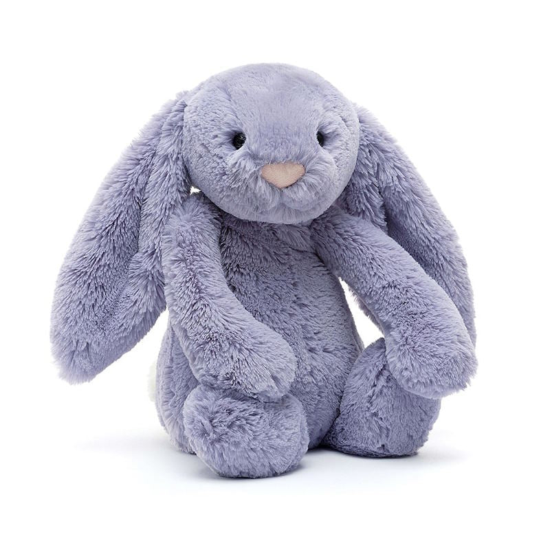 A soft violet furry stuffed bunny with a pink suedette nose and floppy ears.