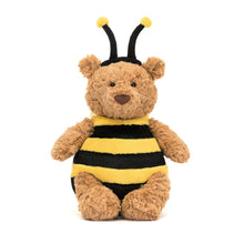 Stuffed toy Jellycat bear dressed as a bee with black and yellow stripes on a white background