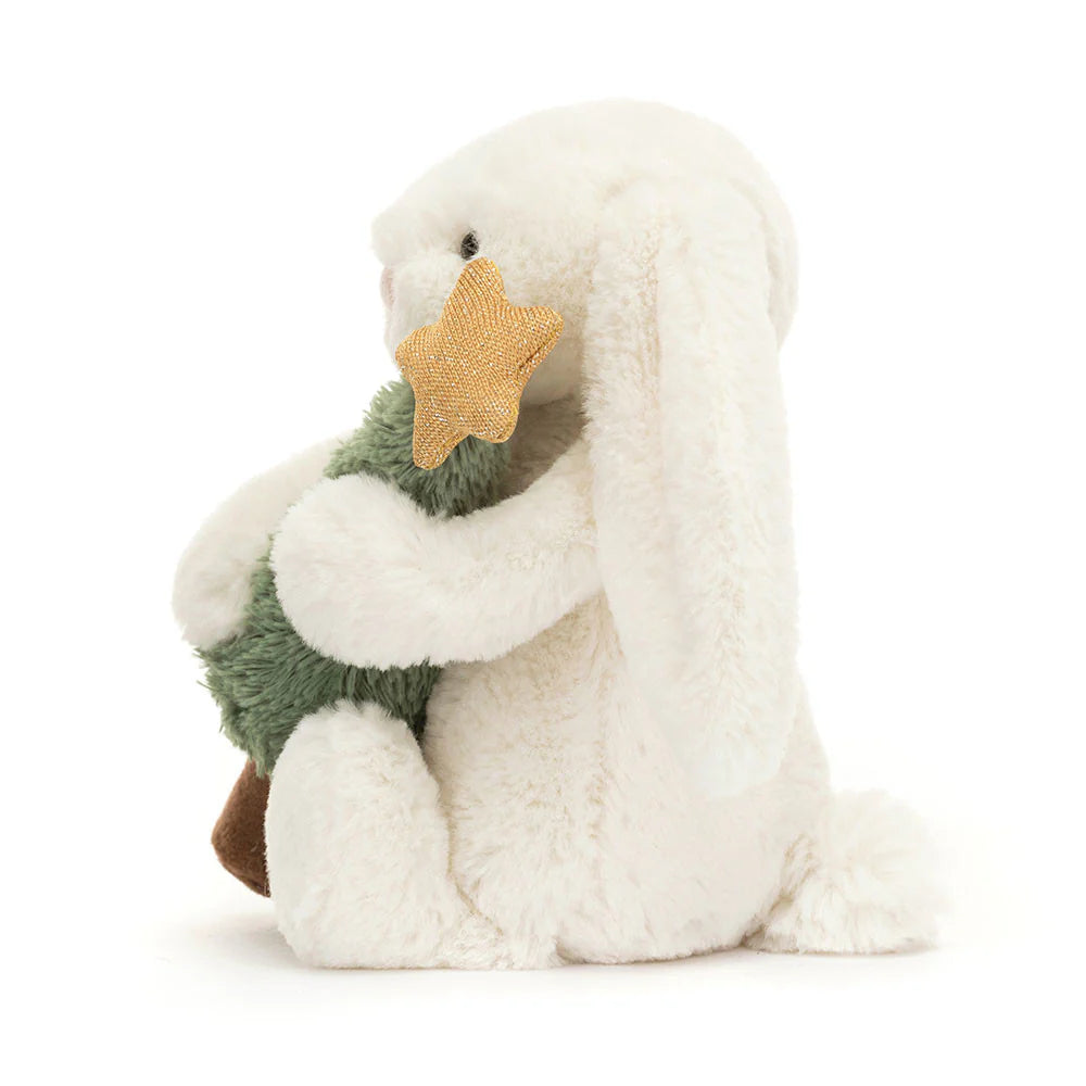 Small cream Jellycat bashful bunny holding a Christmas tree