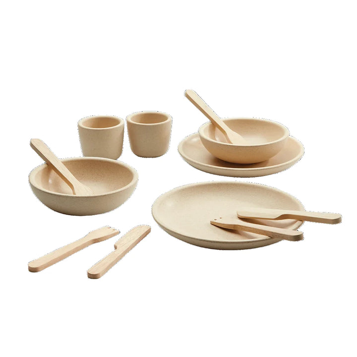 Natural plan wood children’s play dinner set plates, bowls cups and cutlery.