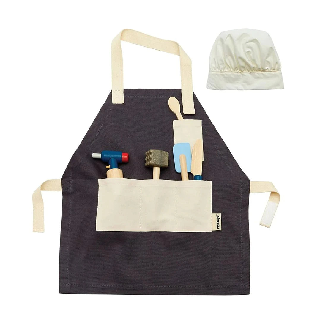 PlanToys wooden chef's toy play set with fabric apron and chef hat.