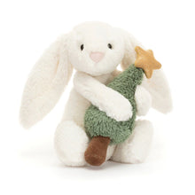 Small cream Jellycat bashful bunny holding a Christmas tree