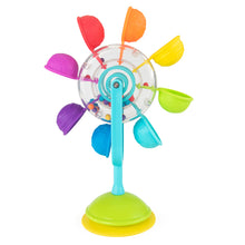 A colorful toy resembling a flower with a spinning wheel in the center and petals in various colors, designed for water play.