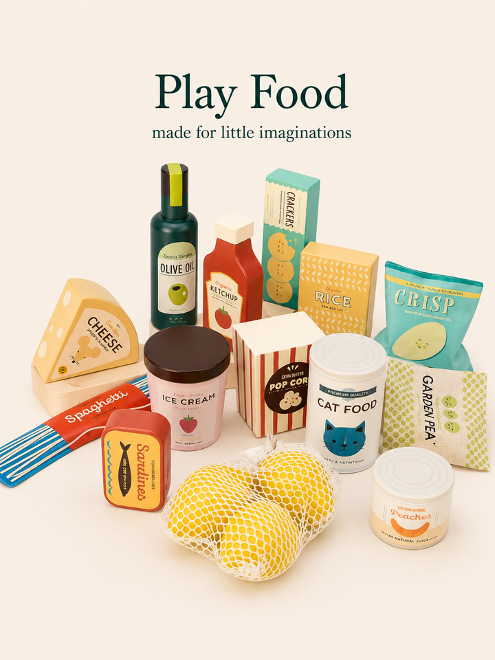 Collection of toy food items with packaging on a white background, featuring text 'Play Food made for little imaginations'.