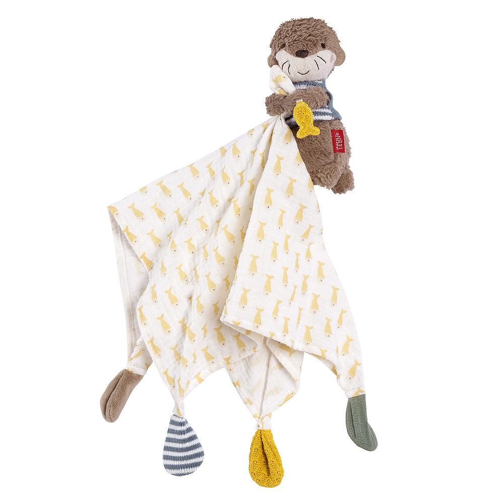 A plush comforter featuring an otter design with a soft, yellow and white patterned blanket and a stuffed otter toy attached.