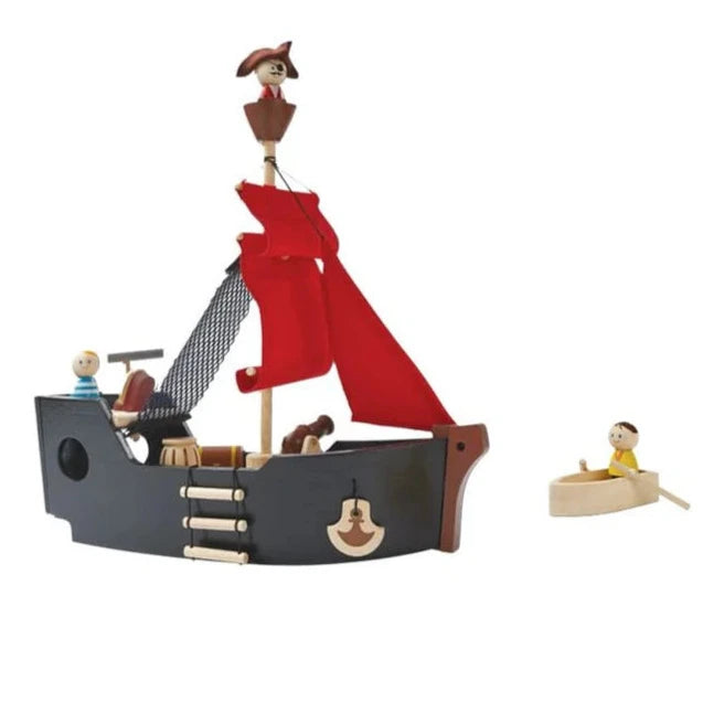 Wooden pirate ship toy with red fabric mast and black hull