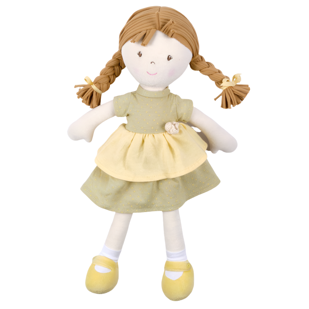 A soft honey-colored cotton rag doll with a summer dress and matching bows in her hair.