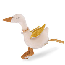 Cream velvet swan shaped baby rattle, gold velvet wings, sparkly gold beak and feet, Moulin Roty brand.