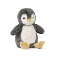 Plush toy penguin on a white background
