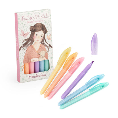 Set of pastel-colored markers with a packaging featuring a girl and cat illustration on a white background.