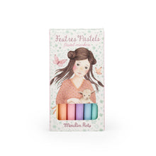 Pack of pastel markers with illustration of a girl holding a lamb on the packaging.