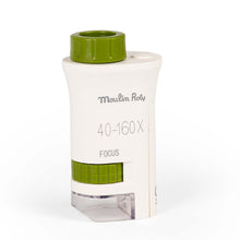 Small cream and white pocket microscope
