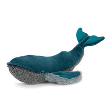 Blue whale-shaped toy on a white background
