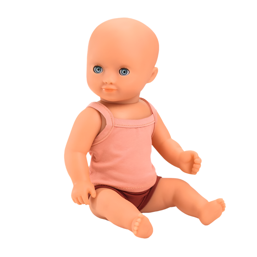 A 32 cm hard-body doll with blue eyes, dressed in a pink singlet top and underpants, designed for children from 18 months old and up.