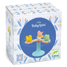 Packaging box of the BabySpini toy featuring a spinning top with three colorful birds.